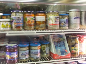 Jars of Śledzie - Pickled Herring in Display case